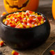 Halloween cauldron full of candy corn